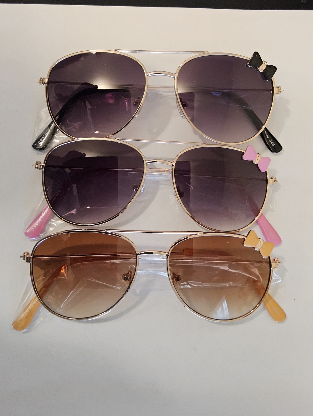 B. Set Of 3 Aviator Sunglasses Trio with Decorative Bows
